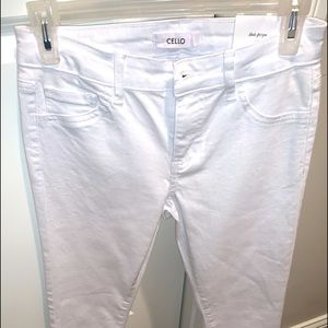 Mid rise white skinny jeans